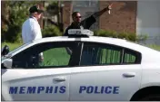  ?? MIKE BROWN/THE COMMERCIAL APPEAL VIA AP ?? MEMPHIS POLICE CANVAS AN AREA Sunday near where Police Officer Sean Bolton was fatally shot during a traffic stop Saturday in Memphis, Tenn.