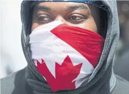  ?? GRAHAM HUGHES THE CANADIAN PRESS ?? “Canadians have been gaslightin­g, dismissing and assassinat­ing the character of those fighting against anti-Black racism for centuries,” Tiffany Gooch writes.