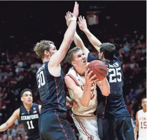  ?? JEFF SWINGER, USA TODAY SPORTS ?? Jakob Poeltl, center, and Utah are a team to watch in the Pac-12 tournament.