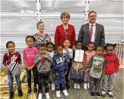  ?? ?? PNC Bank donated 15 iPads and Apple gift cards to Rosa Parks Early Learning Center at the end of April as part of its Grow Up Great program.