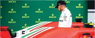  ?? JUN QIAN/JAWA POS ?? GAGAL TERCEPAT: Juara bertahan Lewis Hamilton menempati posisi start kedua pada GP Azerbaijan 2018.