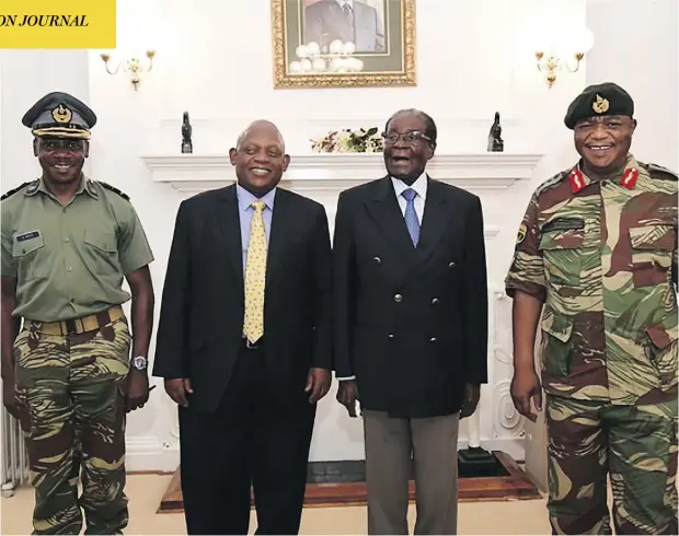  ?? AFP PHOTO / ZBC ?? Zimbabwe President Robert Mugabe, second from right, poses alongside Zimbabwe Defence Forces Commander General Constantin­o Chiwenga, right, and South African envoys at State House in Harare. Chiwenga is the head of the armed forces who ordered the...