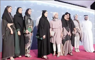  ??  ?? Qatari women filmmakers pose on the red carpet during the sixth edition of the Ajyal Film Festival in the capital Doha on Nov 28, 2018. As Qatari filmmakers gathered on the red carpet at Doha’s Ajyal Film Festival one thing stood out – the majority of local directors are women. Among those showing movies at the annual six-day festival were Aisha al-Shammakh, Nouf al-Sulaiti, and the rising star of Qatari cinema,Amal al-Muftah. (AFP)