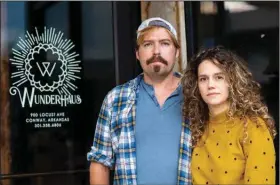  ?? (The Washington Post/Will Newton) ?? Auguste and Kacy Forrester pose in front of the now-closed WunderHaus after struggling through financial troubles and staff losses during the pandemic. “We loved everybody that left and everybody that stayed. And maybe that is what hurt the most is that there were just too many feelings, too much love. Too much,” Auguste said. “I wouldn’t do anything different.”