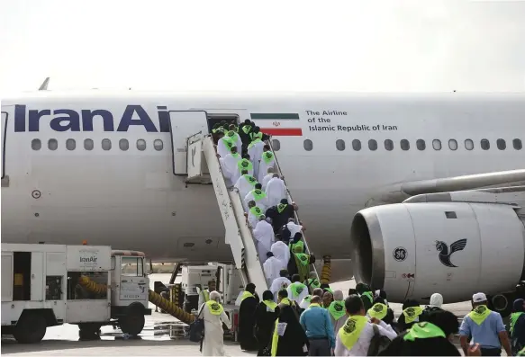  ?? IRNA ?? Iran’s first Umrah pilgrim group in nine years departs from Shiraz Airport for Saudi Arabia after ties between the two countries were restored