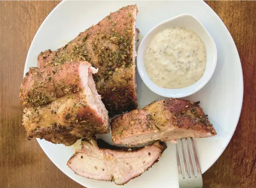  ?? JEANMARIE BROWNSON/TNS ?? A homemade herb and garlic seasoning is a delicious rub for ribs.