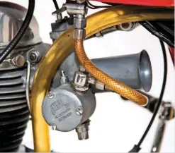  ??  ?? An Amal Concentric carburetto­r feeds the 248cc single-cylinder engine