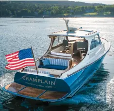  ??  ?? Above: Cherry wood is standard in the cabin, but teak is an option on the semi-custom 40. top: Built to be seen as well as enjoyed, the new Picnic Boat 40 combines classic New England looks with jet-drive propulsion and JetStick steering.