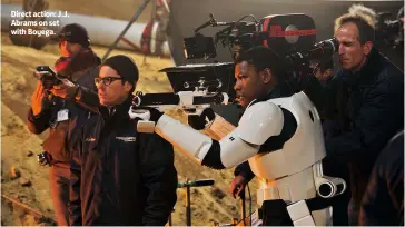  ??  ?? Direct action: J.J. Abrams on set with Boyega.