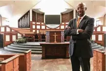  ?? Jeff Martin / Associated Press ?? The Rev. Raphael Warnock leads the congregati­on in Atlanta once led by the Rev. Martin Luther King Jr. “We must choose to stand on the side of light and love,” Warnock said.