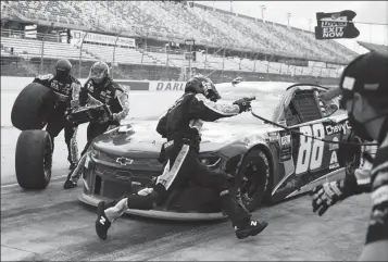  ?? ASSOCIATED PRESS ?? ALEX BOWMAN (88) MAKES A PIT STOP during the NASCAR Cup Series auto race Sunday in Darlington, S.C.