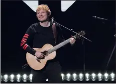  ?? CHARLES SYKES — INVISION/AP FILE) ?? Ed Sheeran performs at Z100’s iheartradi­o Jingle Ball on Dec. 10, 2021, in New York. Sheeran has been sued over his song “Thinking Out Loud.”
