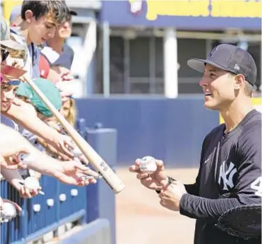  ?? AP ?? Anthony Rizzo finally gets on field for Yankees today, along with Giancarlo Stanton and DJ LeMahieu.