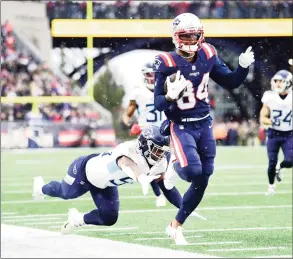  ?? Billie Weiss / Getty Images ?? The Patriots’ Kendrick Bourne runs after the catch for a third-quarter touchdown against the Titans on Sunday.