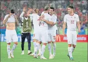  ?? REUTERS ?? Swiss players celebrate after beating Serbia.