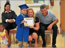  ?? PHOTO BELMONT CHILD CARE ASSOCIATIO­N ?? From left to right: Joanne Adams, Executive Director Belmont Child Care Associatio­n, Elizabeth Loftus, President of the BCCA board and BCCA Chairman Michael Dubb at this year’s graduation ceremony.