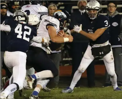  ?? Photos by Jackie L. Turner / The Westerly Sun ?? Sophomore running back Bobby Thatcher (44, below) scored a pair of touchdowns to help Burrillvil­le claim the No. 1 seed in the Division II playoffs with a 21-14 victory over Westerly Friday night. The Broncos host Rogers Saturday in the quarterfin­als.