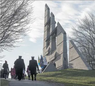  ?? ANDREW VAUGHAN/THE CANADIAN PRESS ?? The Halifax Explosion Memorial Bell Tower on Fort Needham honours the victims and survivors of the massive blast on Dec. 6, 1917, that killed nearly 2,000 people.