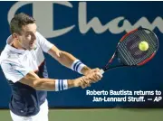  ?? — AP ?? Roberto Bautista returns to Jan-Lennard Struff.