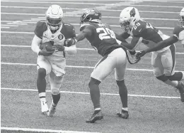  ?? SETHWENIG/AP ?? Cardinals quarterbac­k Kyler Murray runs past Jets free safety Marcus Maye for a first-half touchdown Sunday in East Rutherford, N.J.