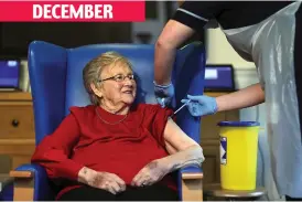  ??  ?? DECEMBER
First up: Annie Innes, 90, gets vaccine at care home in Hamilton