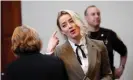  ?? Photograph: Steve Helber/EPA ?? Amber Heard in court with her attorney.