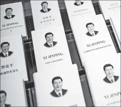  ??  ?? The pen is mightier: Foreign translatio­ns of President Xi Jinping’s book.