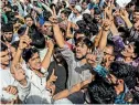  ?? (REUTERS) ?? Kashmiris attend a protest after the Eid-al-adha prayers at a mosque during restrictio­ns after the scrapping of the special constituti­onal status for Kashmir