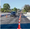  ?? PHOTO: NZTA/ SUPPLIED ?? The first cars travel over the State Highway 26-Morrinsvil­le Road bridge yesterday morning.