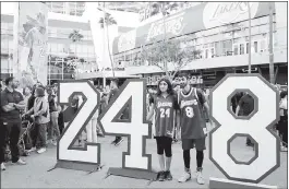  ?? HARRY HOW — GETTY IMAGES ?? Fans honor Kobe Bryant outside Staples Center at an attraction known as Kobeland.