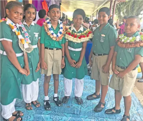  ?? Photo: Losirene Lacanivalu. ?? From left: Ahmadiyya Muslim Primary School deputy headgirls Virisine Talakinona, Prishanta Sharma with headboy Tushal Prasad, headgirl Akesa Domowai and deputy headboys Zsaderick Maya and Ilaiti Bulai.