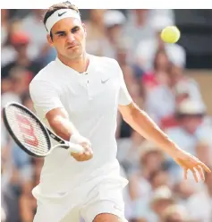  ??  ?? Federer in action during his first round match against Alexandr Dolgopolov at the Wimbledon Championsh­ips at The All England Lawn Tennis Club in Wimbledon, southwest London. — Reuters photo