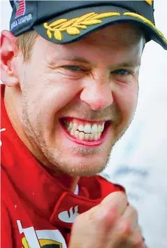  ??  ?? Quattro titoli Sebastian Vettel, 27 anni, prima vittoria con la Ferrari
(Epa)