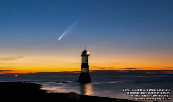  ??  ?? Comet in sight: the sea affords a chance to see celestial objects skirting the horizon, like in this image of Comet NEOWISE captured above Anglesey in 2020