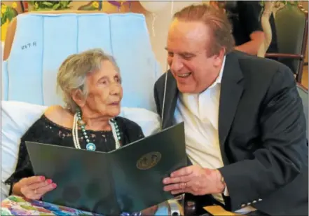  ?? SUBMITTED PHOTO ?? State Sen. Andy Dinniman, D-19, reads a special Senate citation to Gertrude Faillaci in honor of her 107th birthday.