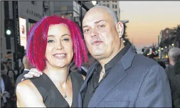  ?? TODD WILLIAMSON / INVISION 2012 ?? Four years after “Matrix,” filmmaker Lana Wachowski (left) revealed she is transgende­r, her sibling and filmmaking partner, formerly known as Andy Wachowski, has come out as transgende­r, too. Her name, according to a statement issued to the Windy City...