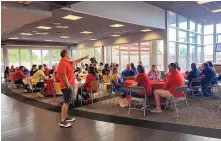  ?? COURTESY OF UNM ATHLETICS ?? University of New Mexico football coach Danny Gonzales speaks to the Lobo freshmen and their parents during a dinner event on Friday night at the Tow Diehm facility.