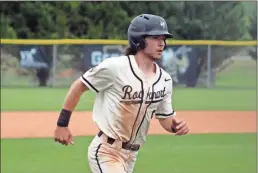  ?? Jeremy Stewart ?? Rockmart’s Cole Deems heads in to score on a two-out hit by Steven Gregory during Friday’s game against LaFayette at Rockmart High School.