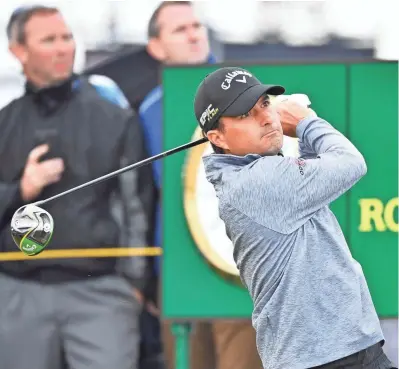  ??  ?? Kevin Kisner hits his tee shot on the 10th hole during the first round of the British Open on Thursday at Royal Portrush in Northern Ireland. STEVE FLYNN / USA TODAY SPORTS