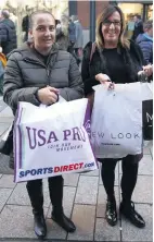  ??  ?? Belfast shoppers Pauline McCausland and Amanda Brown and (left) Shannon Lynch