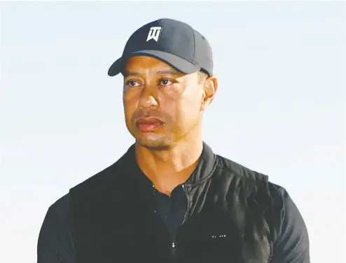  ?? RYAN KANG / THE ASSOCIATED PRESS ?? Tiger Woods, pictured at Riviera Country Club on Sunday, was injured in a vehicle rollover south of Los Angeles
on Tuesday. He had to be removed from the vehicle through the windshield using a pry bar and an axe.