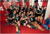  ??  ?? The Black Ferns celebrate after being crowned World Cup champions in Belfast last year.