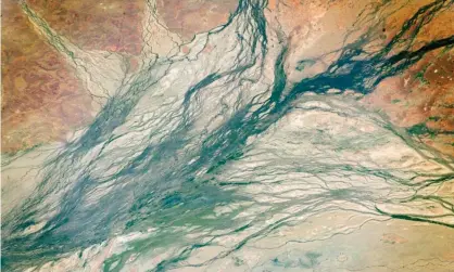  ?? Photograph: ISS/NASA ?? Queensland channel country: Origin Energy wants leases to explore the Lake Eyre basin to the east and south-east of Windorah.