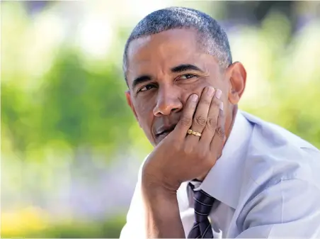  ?? PICTURE: WHITE HOUSE ?? POISED: President Barack Obama listens during a technology strategy discussion in the Rose Garden of the White House in October 2014.