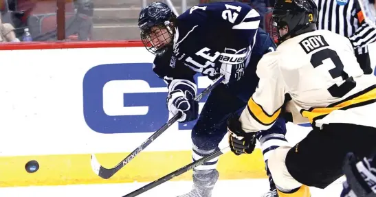  ??  ?? John Hayden ( 21) is 6- 3, 217 pounds and plays a physical game. Coach Joel Quennevill­e says the Blackhawks don’t have a lot of guys who play that way.