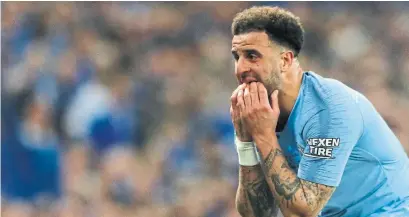  ?? ALASTAIR GRANT THE ASSOCIATED PRESS ?? Manchester City's Kyle Walker reacts during a tense moment in the match against Chelsea at Wembley. City won 4-3.