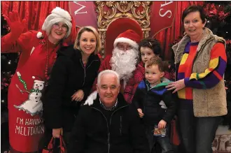  ??  ?? Santa will be at the Manor West Shopping Centre Thursdays, Fridays and Saturdays. Pictured visting Santa are Margaret Lynch, Pa Lynch, Una Flaherty, Kelly and Padraig Flaherty from Tralee.