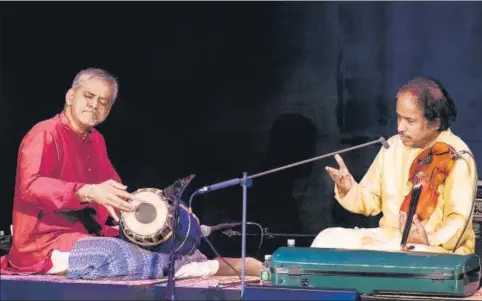  ?? GETTY IMAGES ?? Mahesh Krishnamur­thy (left) plays the ■ mrdangam with composer L Subramania­m on violin at a concert in New York in February 2016