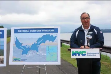  ?? PHOTO BY WILLIAM J. KEMBLE ?? Vincent Sapienza, acting commission­er of the New York City Department of Environmen­tal Protection, speaks Thursday alongside the Ashokan Reservoir about the planned 10-year Ashokan Century Program.