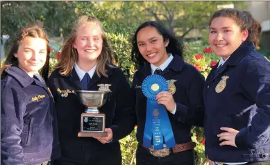  ?? COURTESY PHOTOS ?? Members of the Lodi High School FFA team pose with their first-place award for Light Horse Judging at the state championsh­ip in San Luis Obispo on May 4.